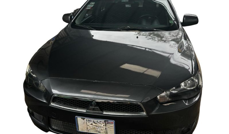 Excelente 2011 Mitsubishi Lancer lleno