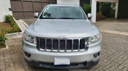 Excelente 2012 Jeep Grand Cherokee lleno