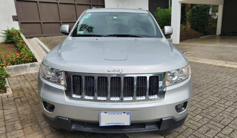 Excelente 2012 Jeep Grand Cherokee lleno