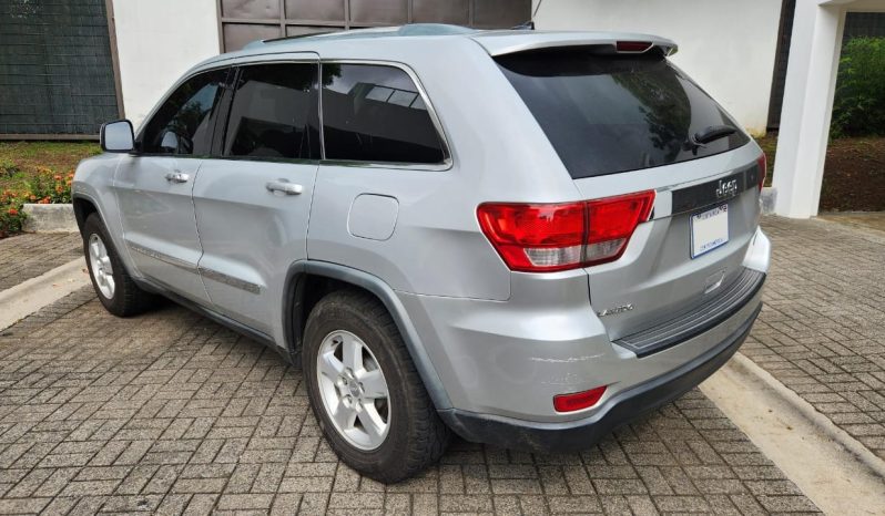 Excelente 2012 Jeep Grand Cherokee lleno