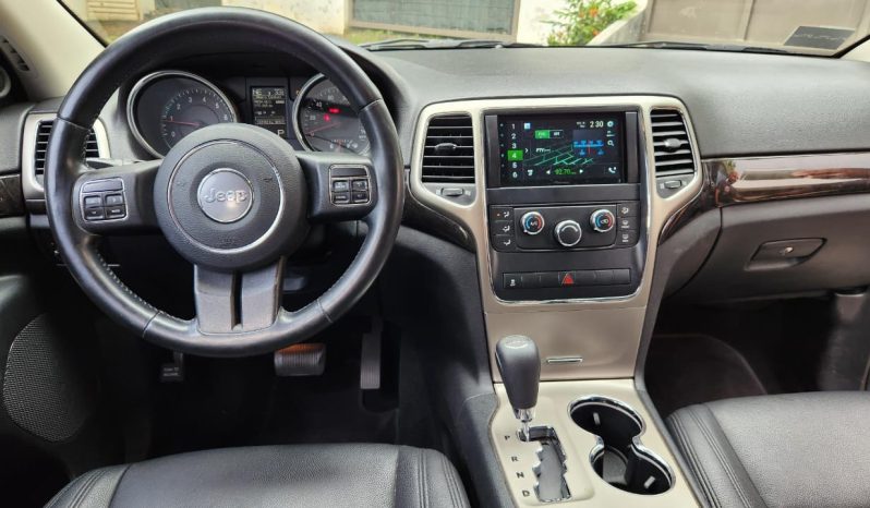 Excelente 2012 Jeep Grand Cherokee lleno