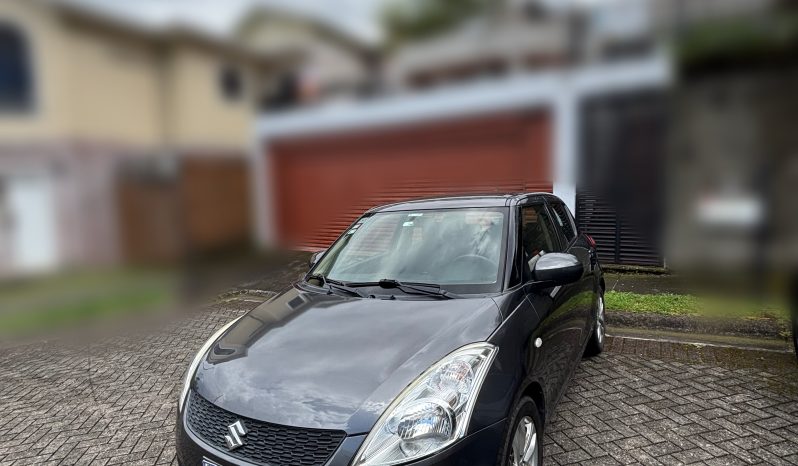 Excelente 2015 Suzuki Swift lleno