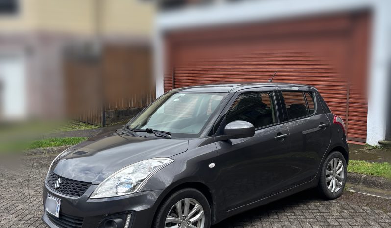 Excelente 2015 Suzuki Swift lleno