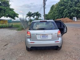 Excelente 2012 Suzuki SX4 lleno