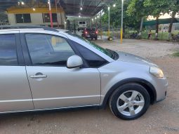 Excelente 2012 Suzuki SX4 lleno