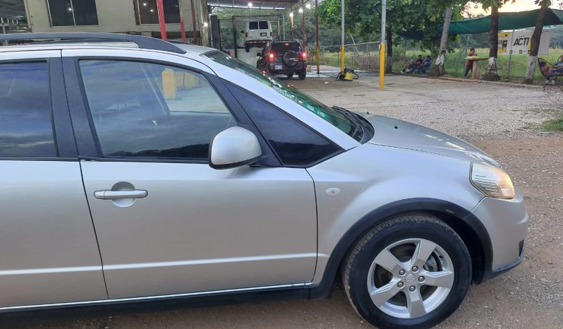 Excelente 2012 Suzuki SX4 lleno